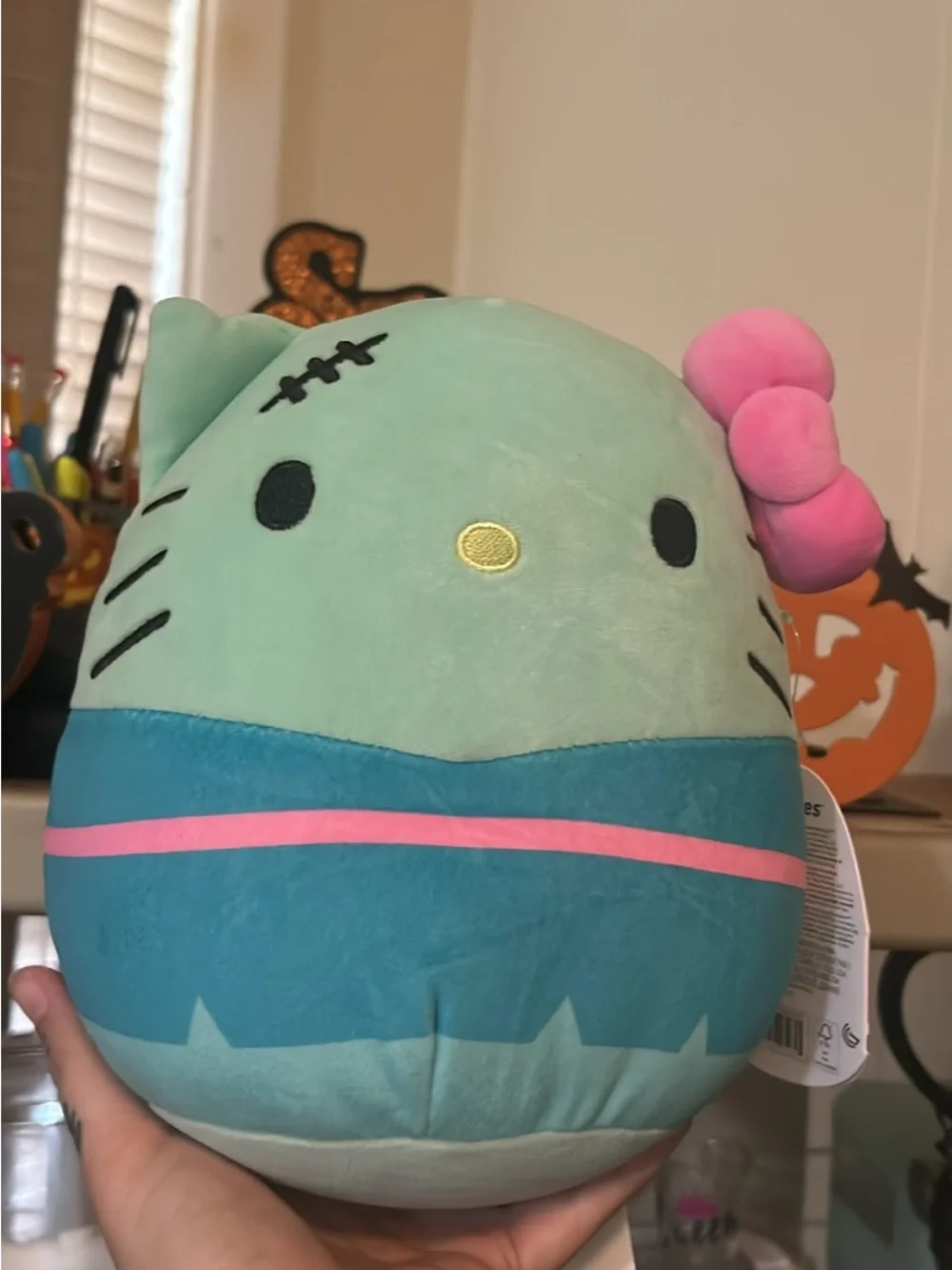 Squishmallows Mint Green Kitty Plush with Pink Bow